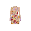 Model wearing Kouvr floral embroidered mini dress at a luxury event