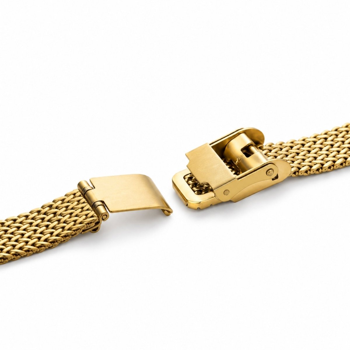 Detailed view of the adjustable stainless steel gold sliding clasp on a woven mesh watch band