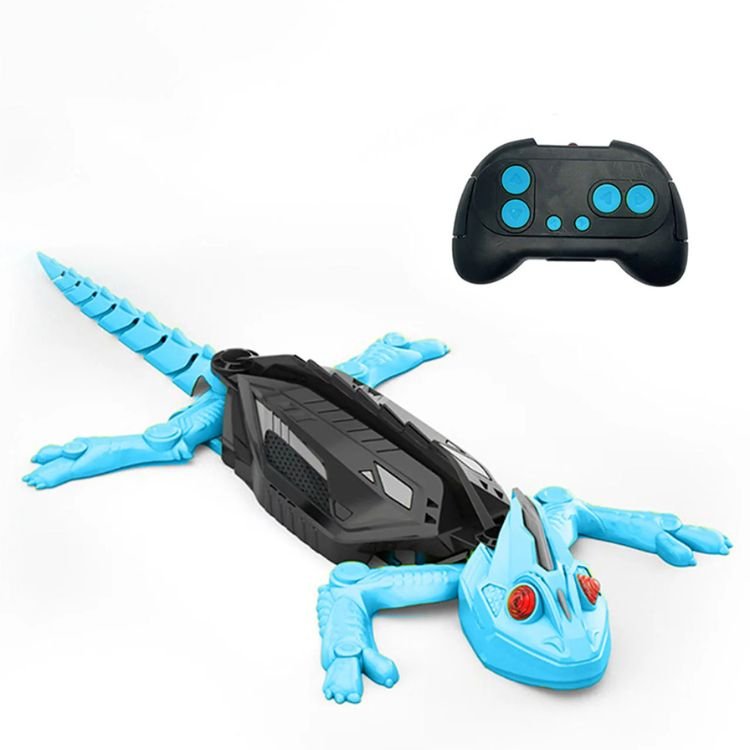 A product shot of a light blue remote control wall climbing gecko toy with red eyes, shown next to its black remote controller.