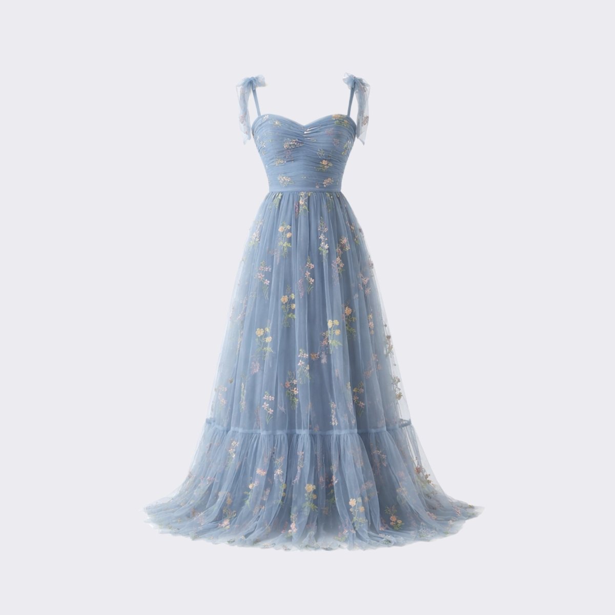 Studio flat lay front view of the Kouvr ethereal blue floral embroidered tulle maxi dress showing the sweetheart neckline and tiered ruffle hem.