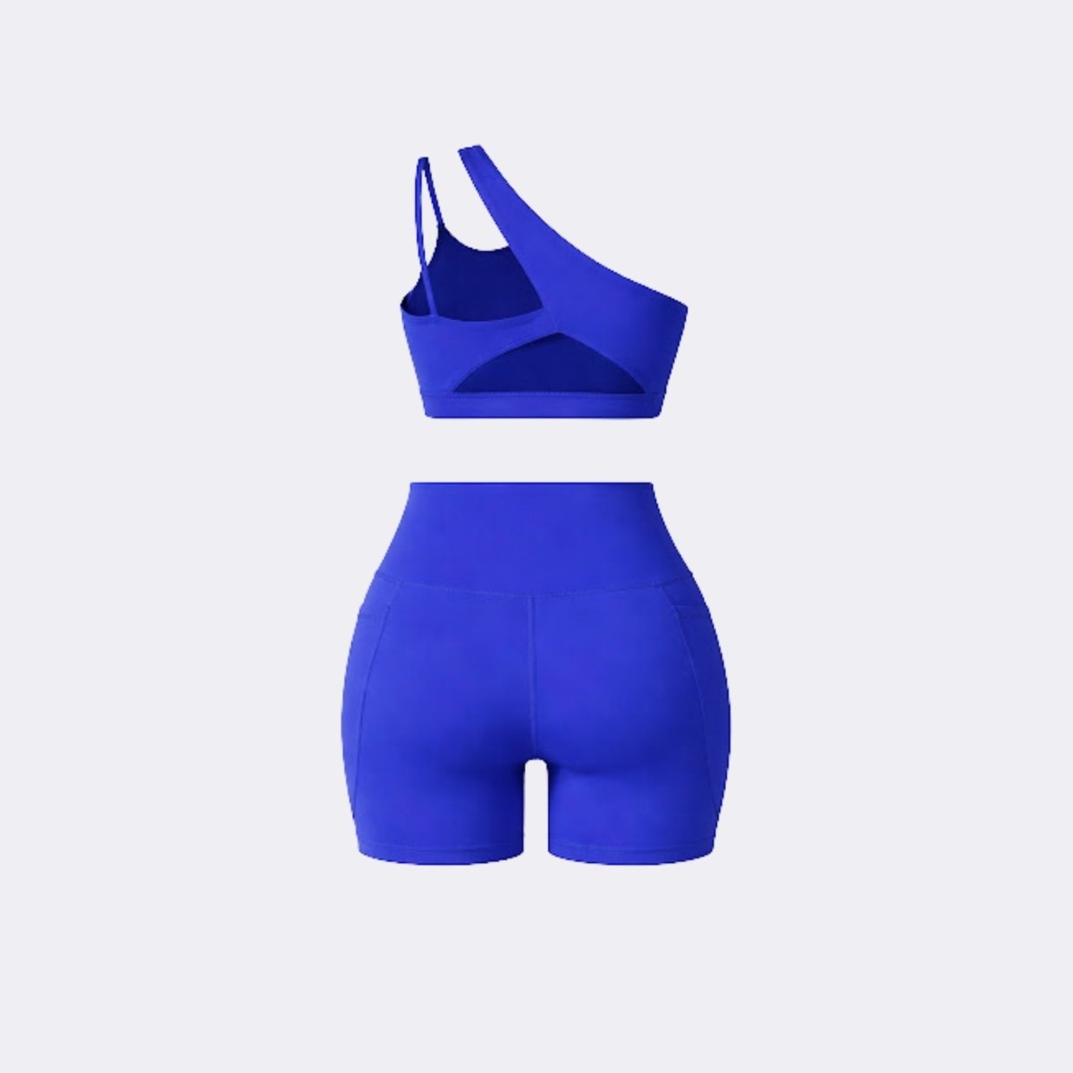 Ghost mannequin back view of dark blue two piece workout set detailing back cutouts and high waisted seam construction