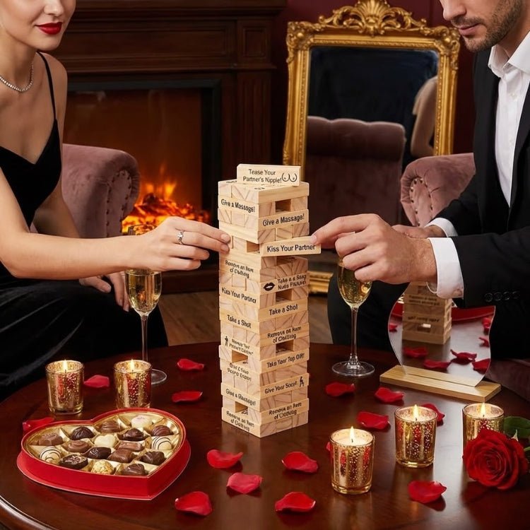 A couple’s hands pulling a block from a naughty wooden tower game with prompts like "Tease Your Partner’s Nipple" during a romantic champagne date night.