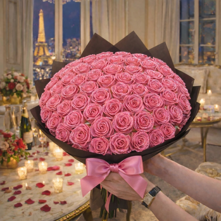 A huge, spherical bouquet of pink sparkle roses held in a romantic Parisian night setting, perfect for a proposal gift.
