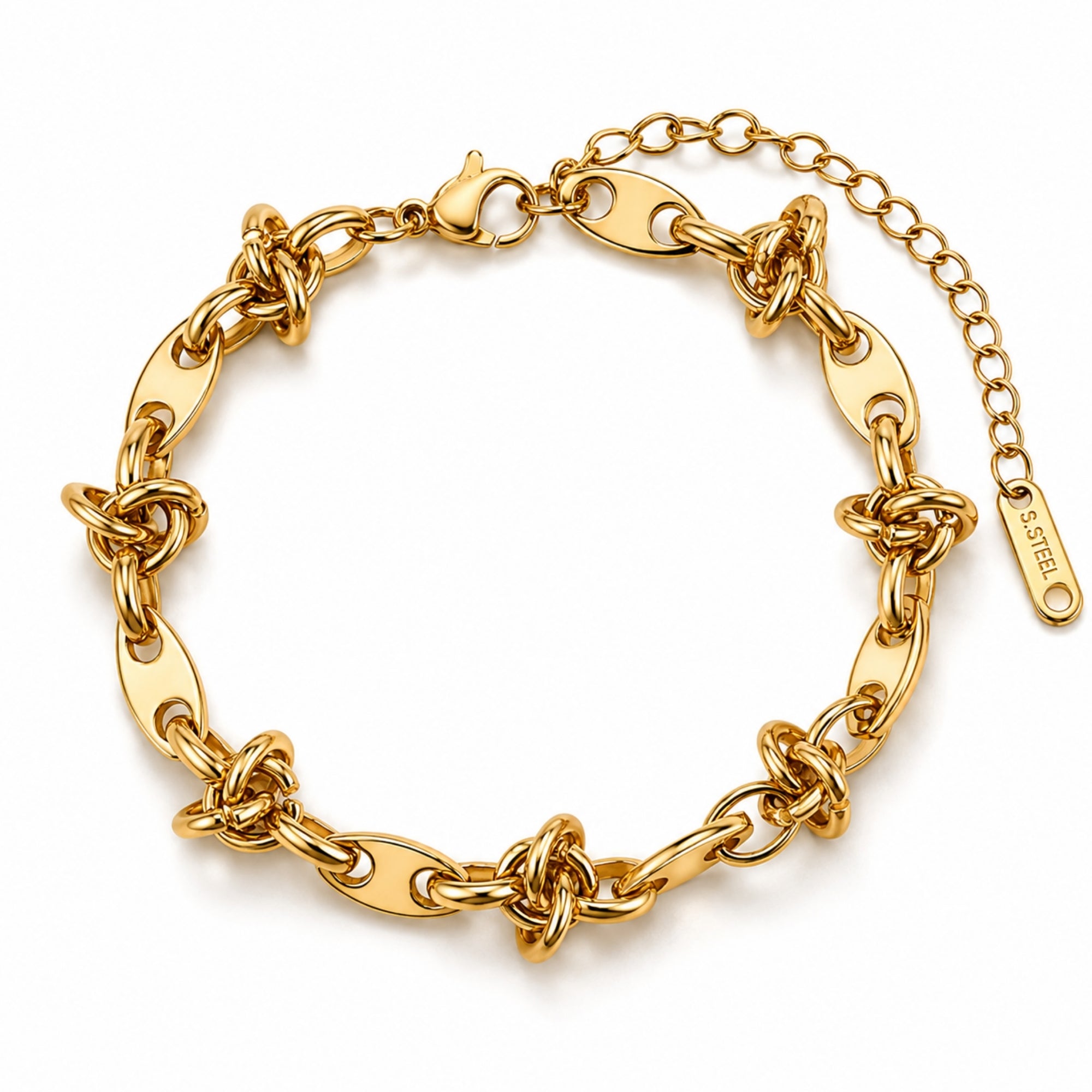 Close up of luxury polished gold chunky knot link chain bracelet for women featuring oval plates on a clean white background.