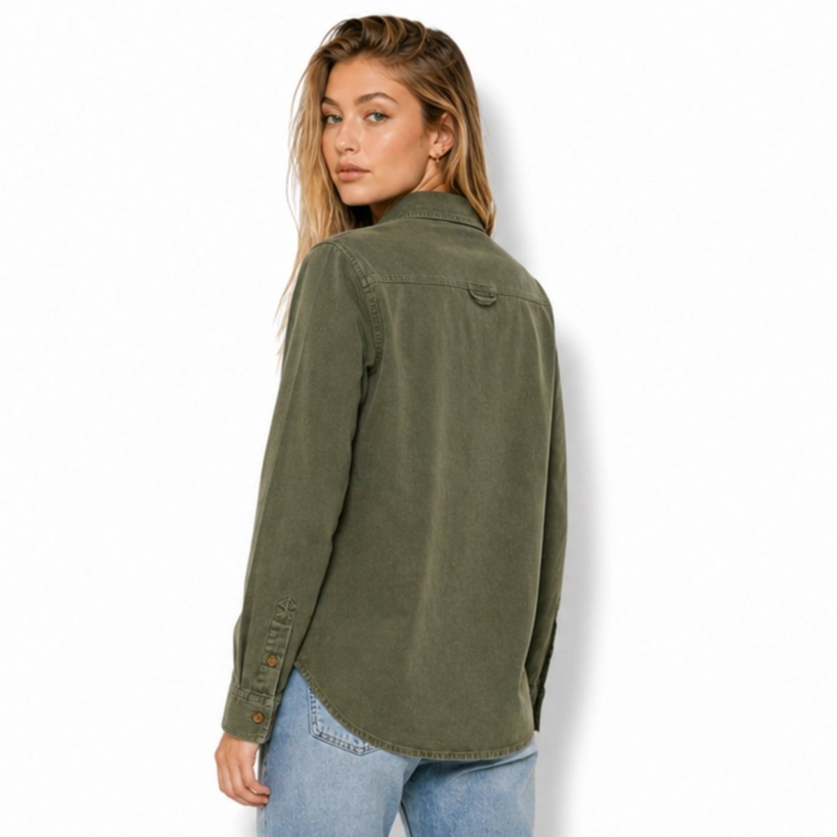 Back view of an olive green sueded cotton button down shirt showing yoke and curved hem details