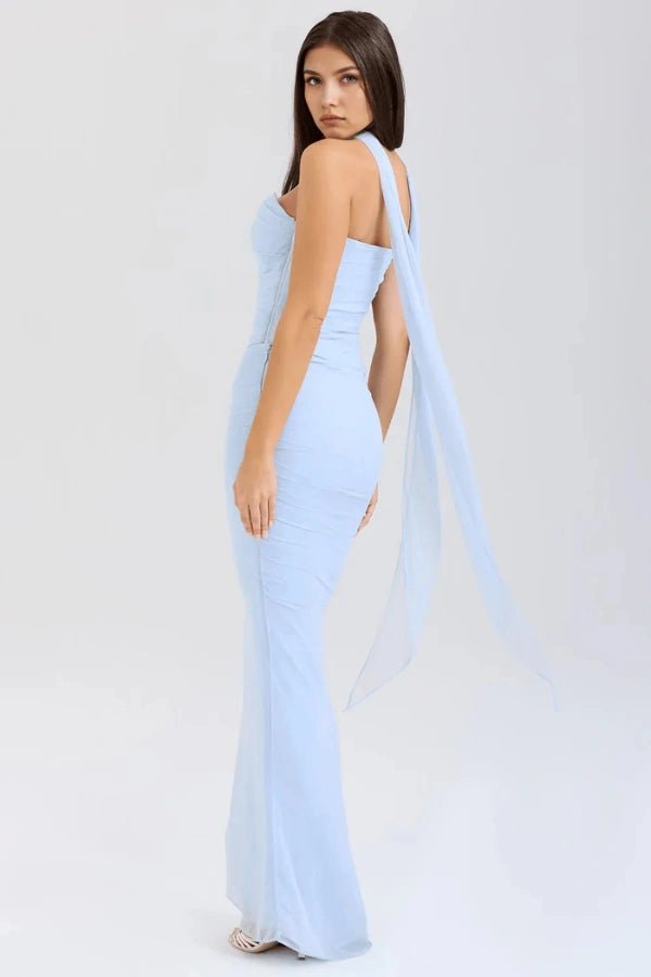 Back three-quarter view of the Hailey light blue formal gown, highlighting the long, flowing mesh scarf that extends from the choker neck.