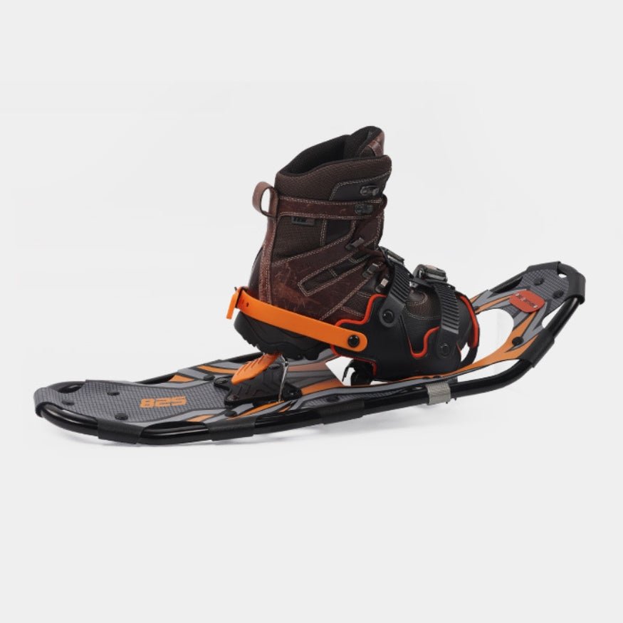 Sideview of a snowshoe showcasing aggressive steel crampons for ice and hard-packed snow.