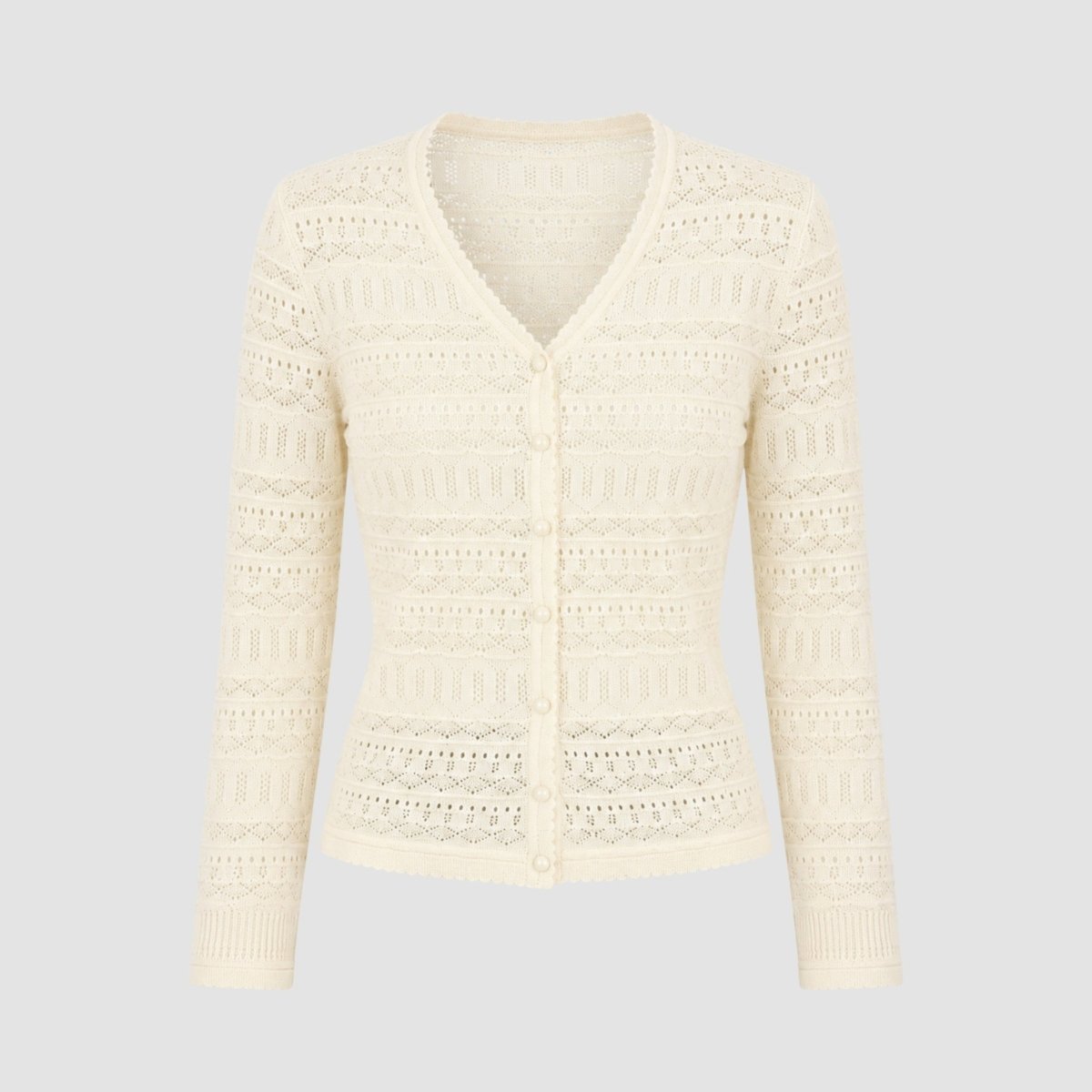 Ivory lightweight pointelle knit sweater with tonal buttons and scalloped trim