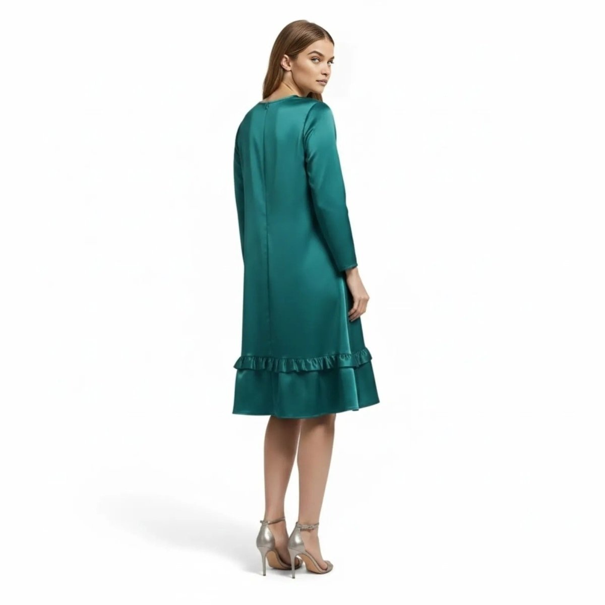 Back view of a model wearing the Kouvr Adalee long sleeve satin cocktail dress in teal.