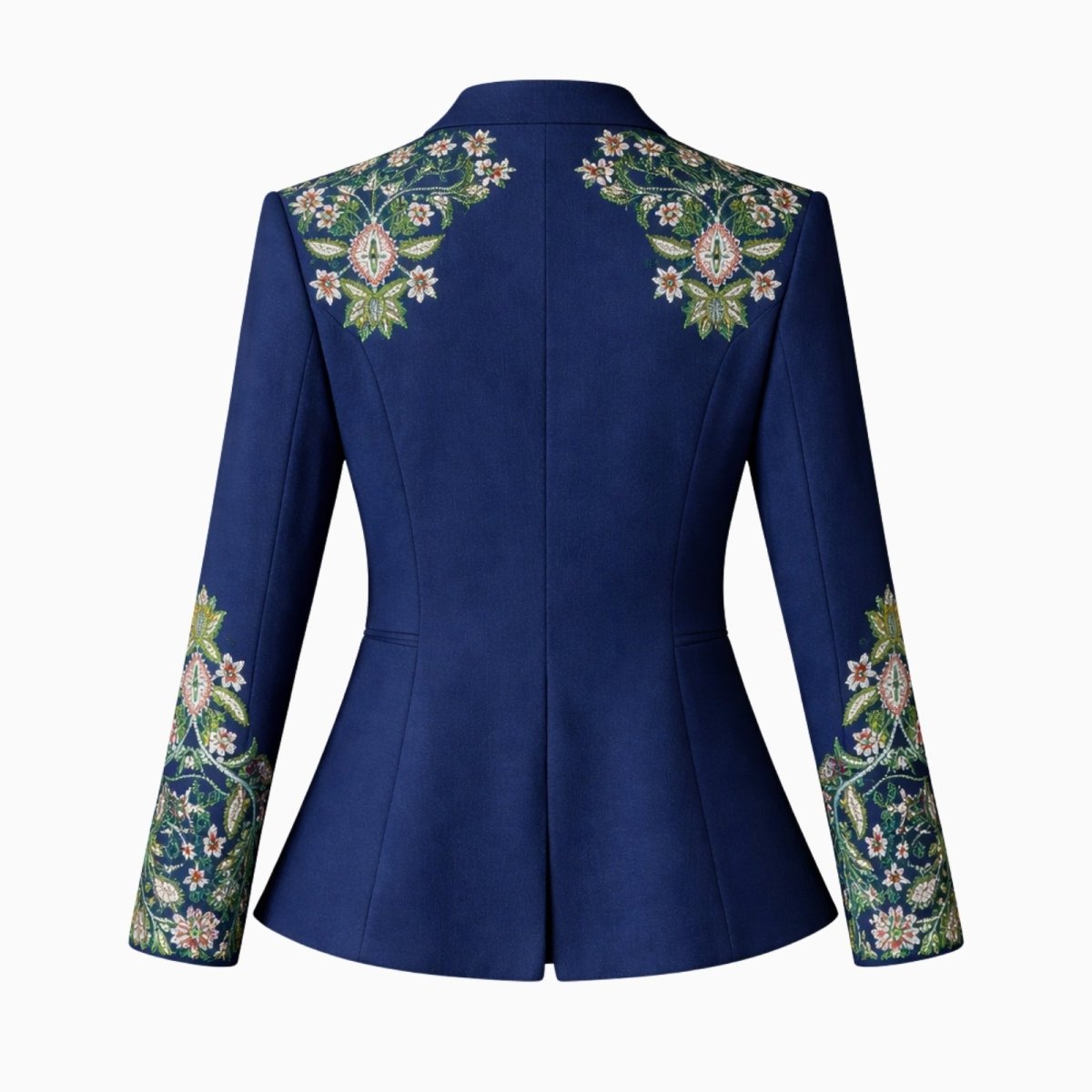 Back view flat-lay of the Kouvr Aiko green jacket, detailing the embroidery on the shoulders and cuffs against a white background