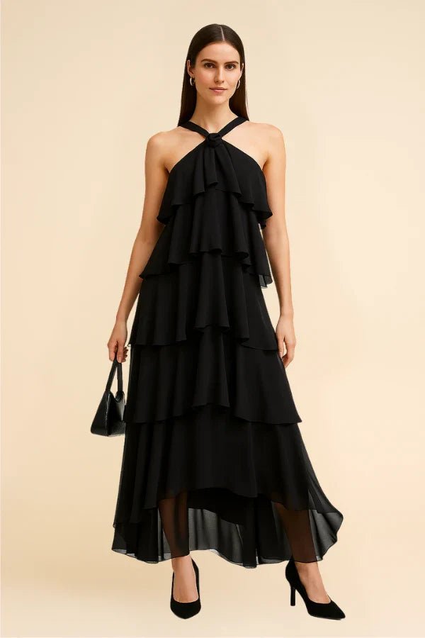 flowy," "cascading," "elegant silhouette," "floor-length," "sophisticated," and "minimalist formalwear