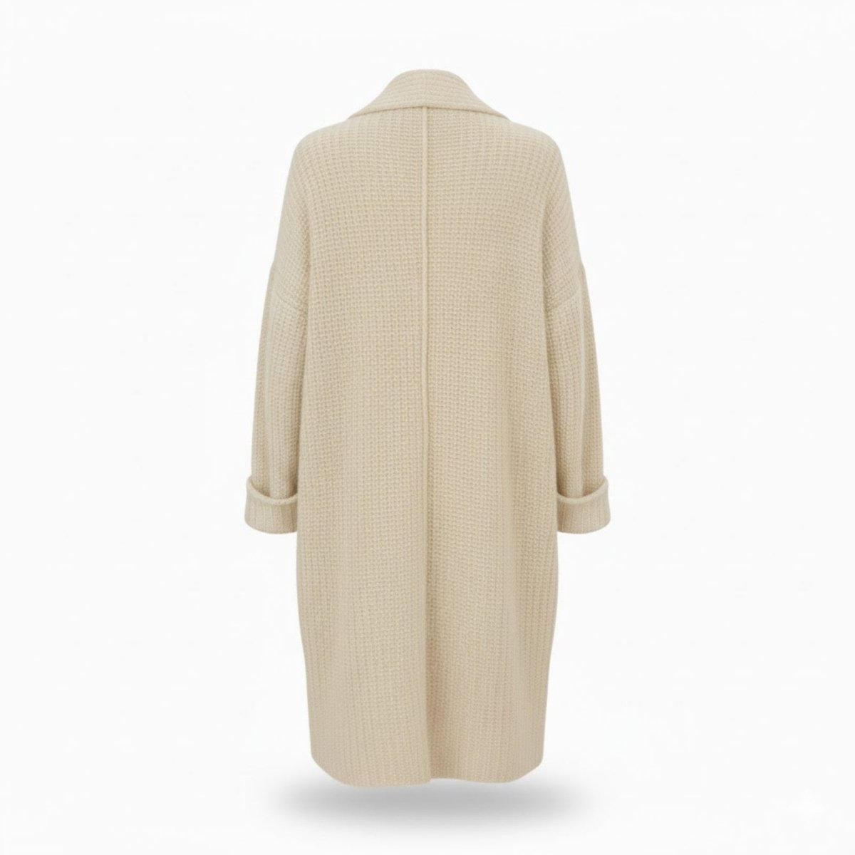 Rear studio shot of the ivory waffle knit long cardigan, showing the center back seam and cuffed sleeve details.