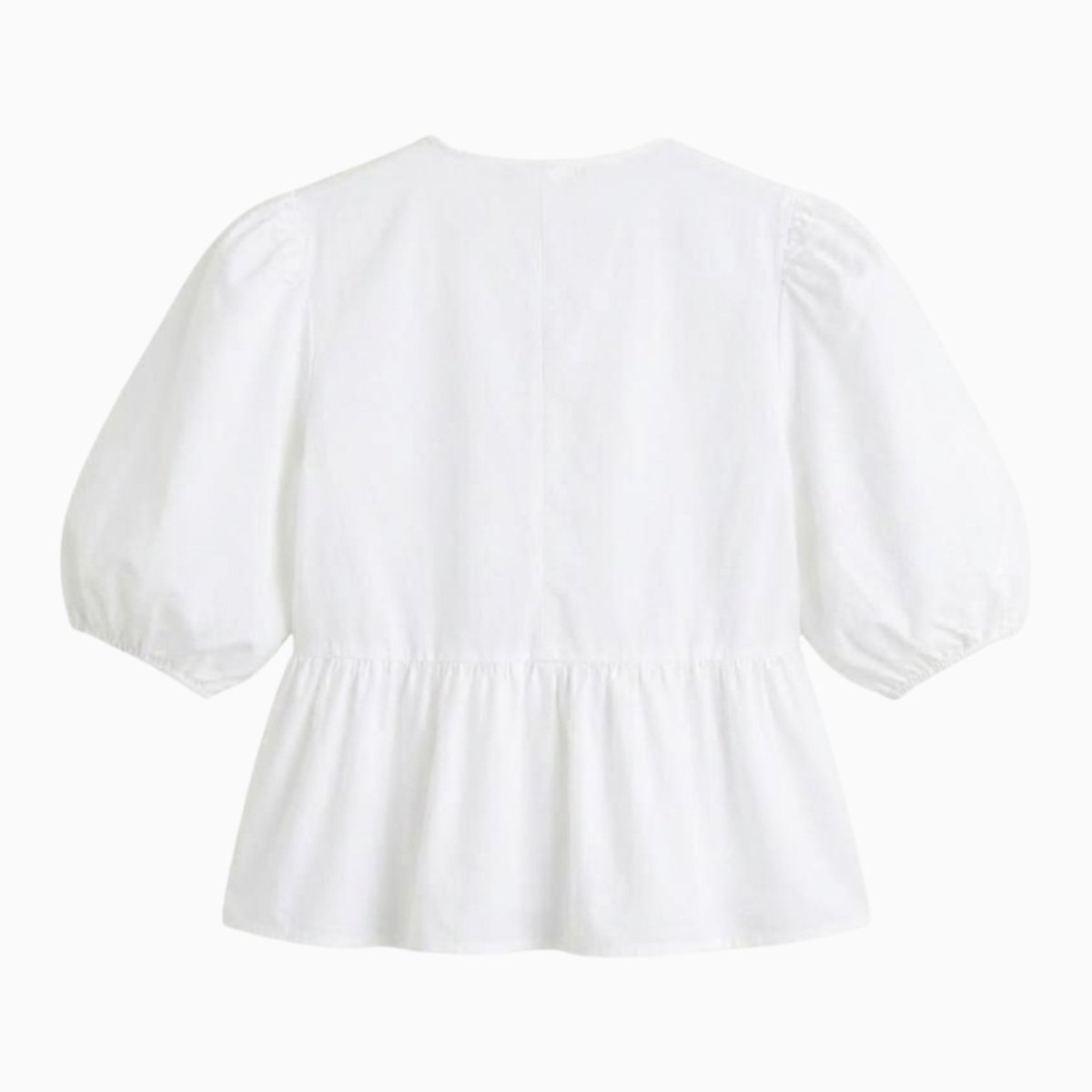 Product shot from the back of the white Kouvr Anne peplum blouse on a white background.