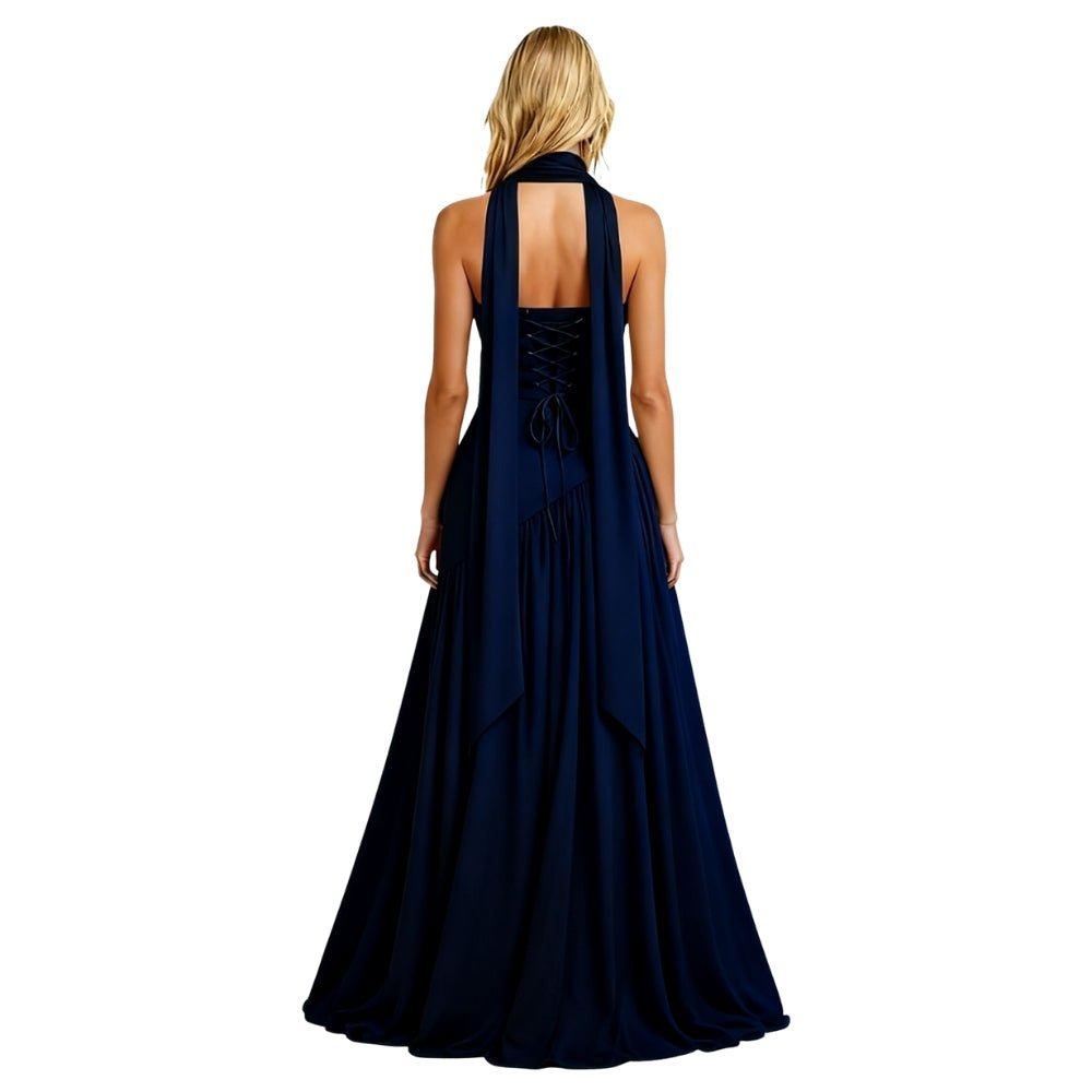 Navy Kouvr evening gown with a halter neck and lace-up back on a white background