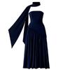 Navy Kouvr evening gown with a draped effect on a plain background