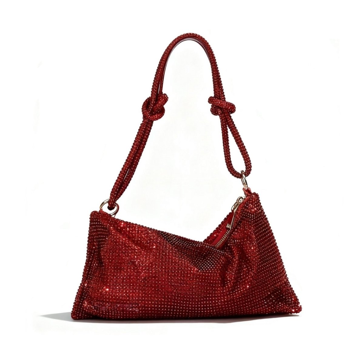 Kouvr Aria red crystal shoulder bag with a knotted handle on a white background.