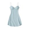 Flatlay photo of the front of the Kouvr Ariadne light blue satin slip dress, displaying the structured bustier cups and sweetheart neckline.