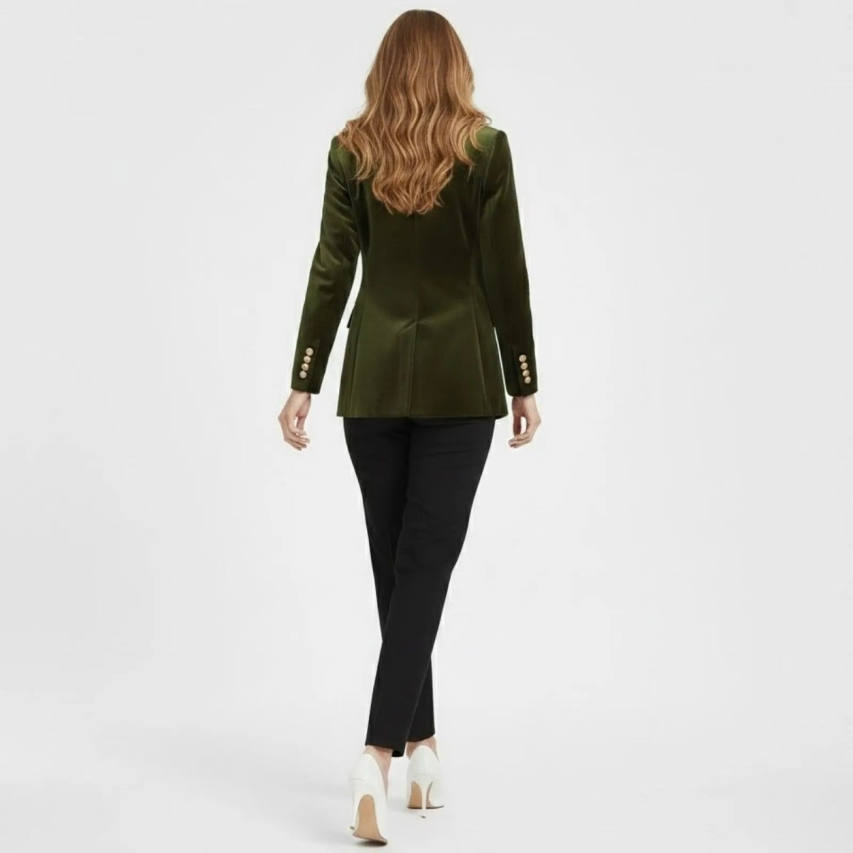Back view of the Kouvr women's olive velvet blazer, showing the single back vent and expert tailoring.
