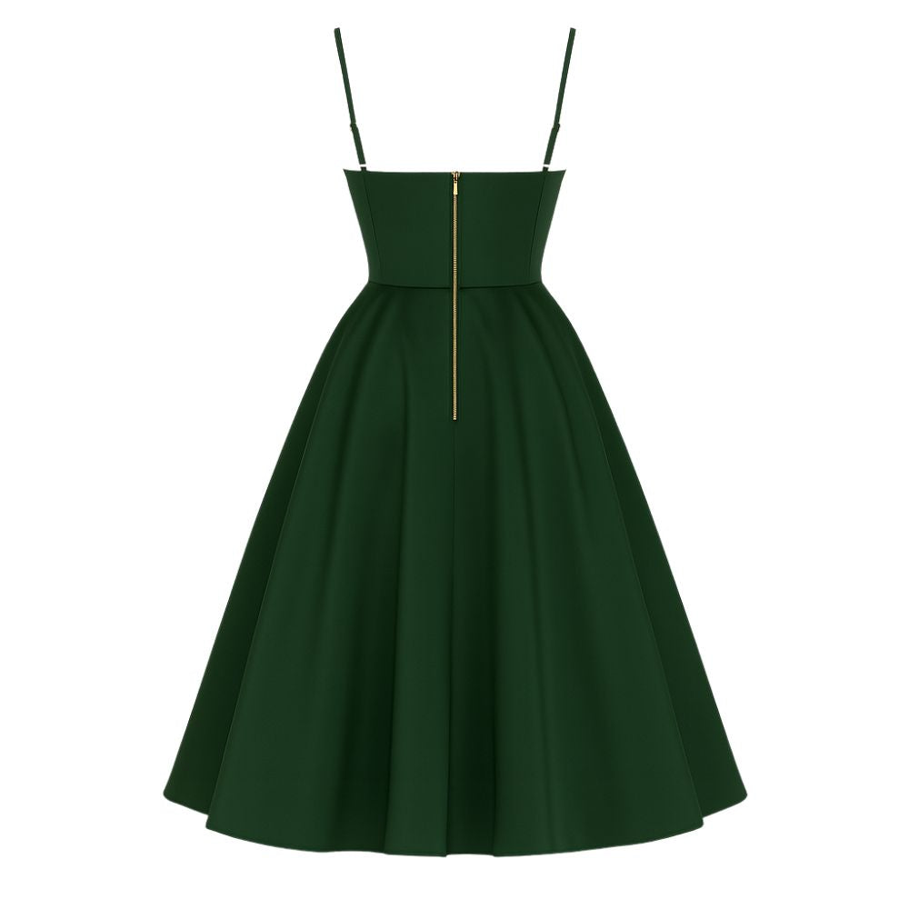 Green kouvr dress with thin straps on a white background