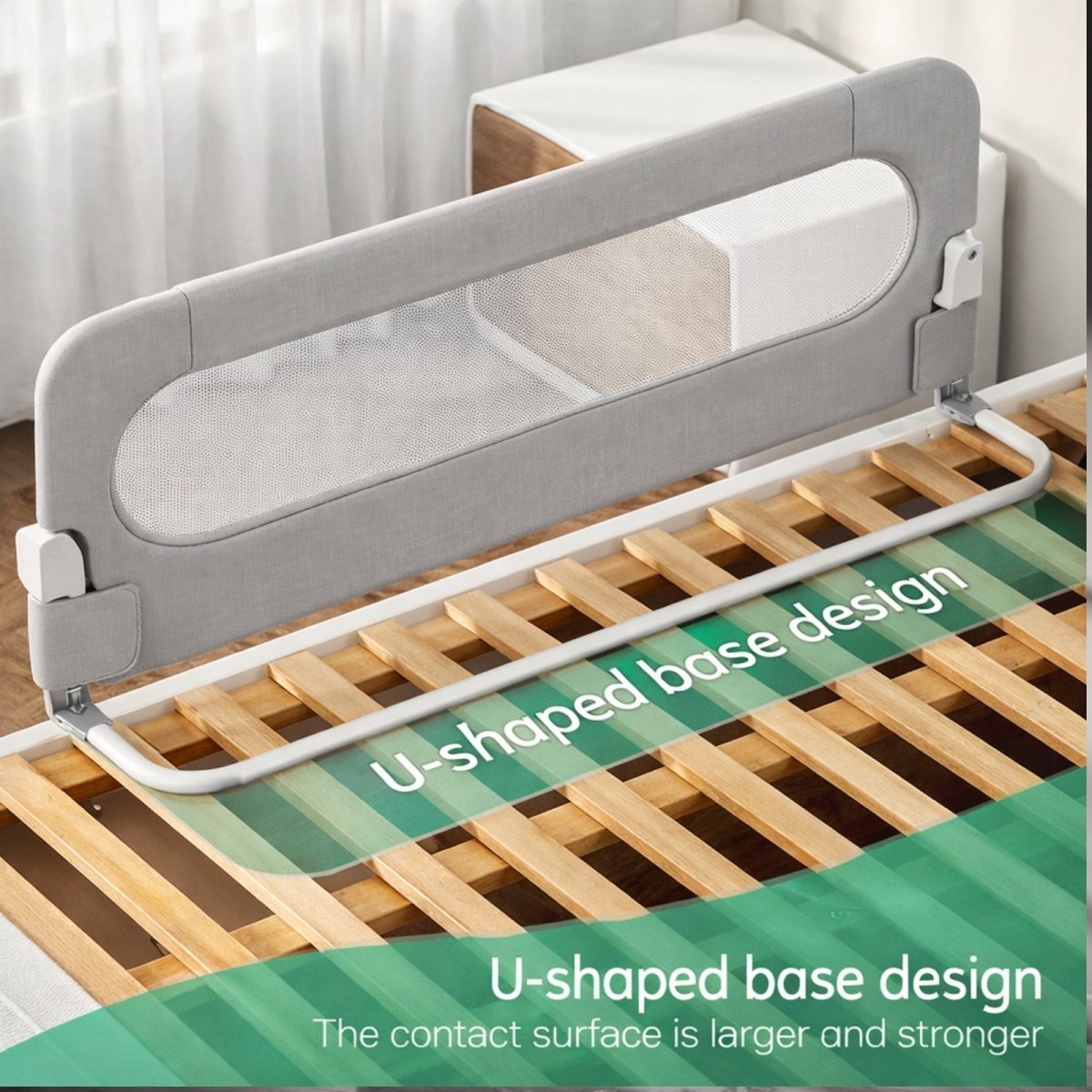 The U-shaped base design of the Kouvr bed rail shown on wooden bed slats, highlighting its large and strong contact surface for stability.