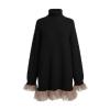 Product-only image of the Kouvr black turtleneck sweater dress, showing the ribbed knit texture and beige tulle trim at the hem and cuffs.
