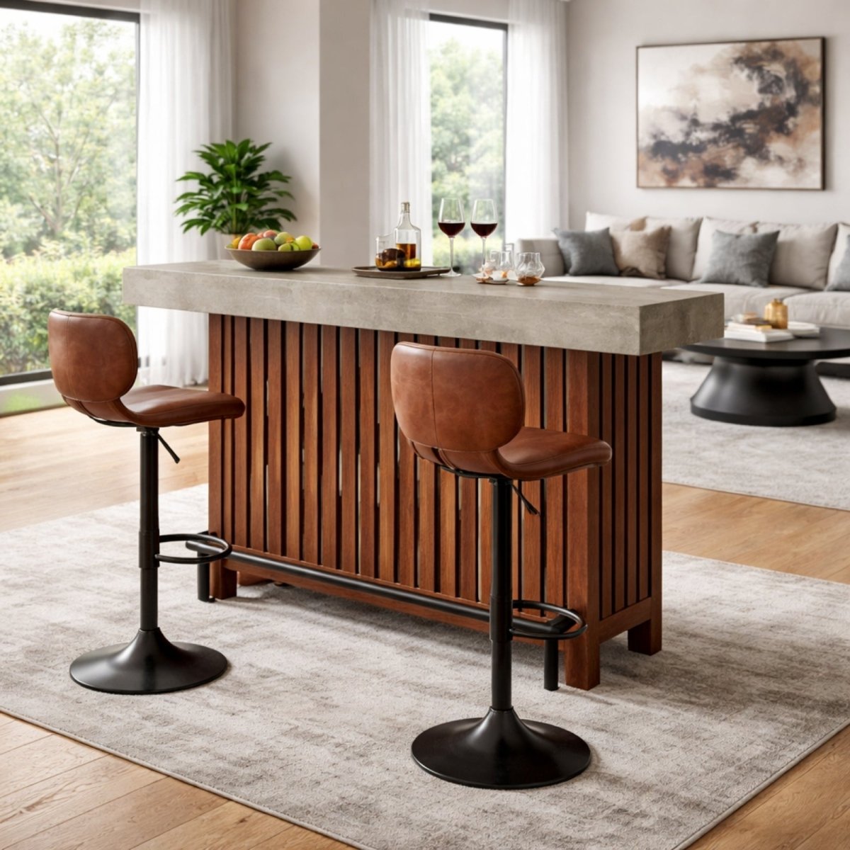 Rear angle view of the Kouvr wood and concrete bar, showing its placement in an open-plan living area with a sofa in the background.