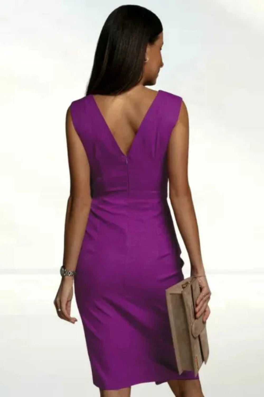 Model wearing the Kouvr Clara draped sheath dress in majestic orchid purple for a formal event
