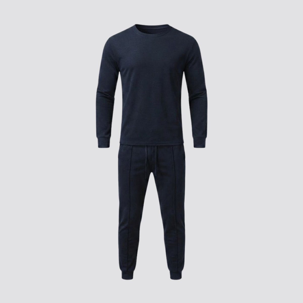 Front view of the Kouvr Crue navy blue crewneck sweatshirt and matching jogger pants laid flat on a neutral background.
