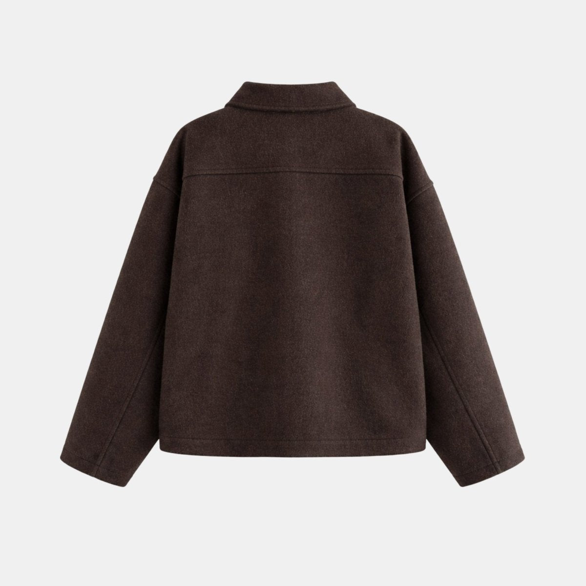 Flat lay studio shot of back seaming and relaxed silhouette of Kouvr dark brown wool jacket.