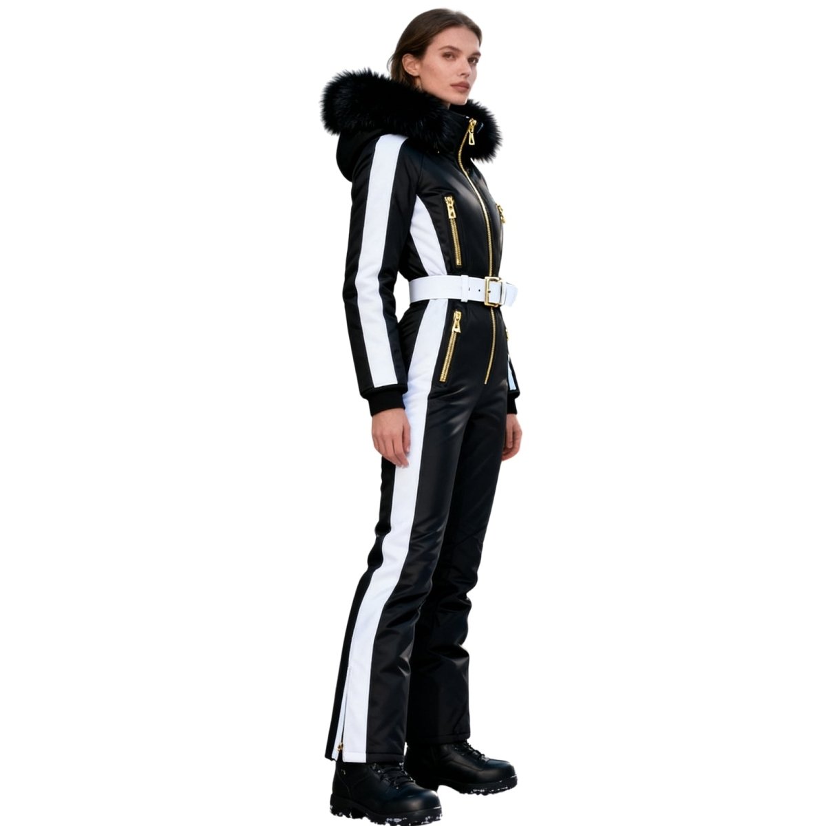 Woman wearing a black and white Kouvr ski suit with fur hood on a white background