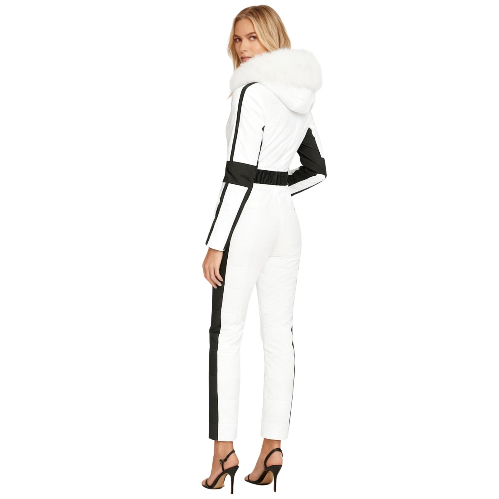 Woman wearing a white and black Kouvr outfit on a white background