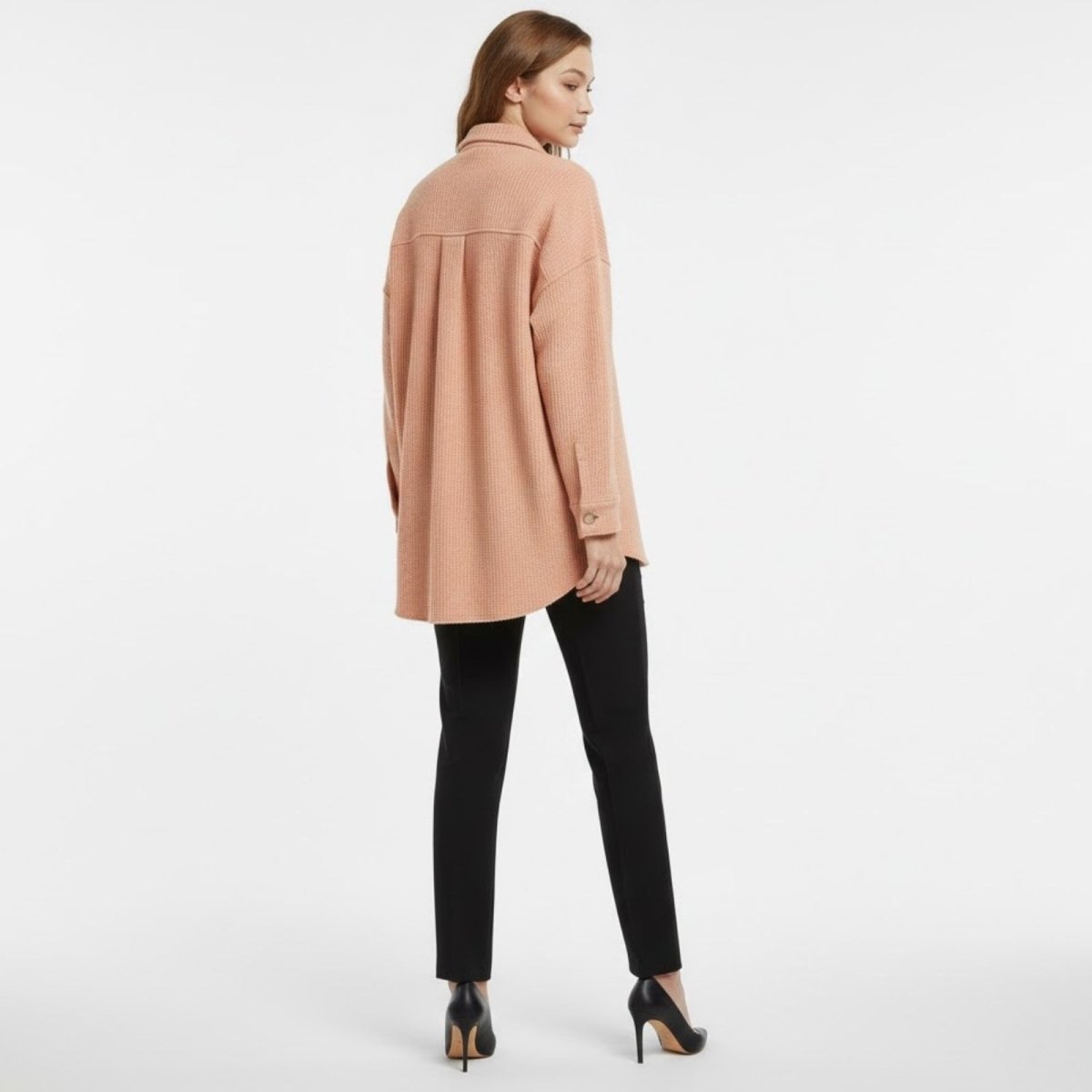 Back view of the women's Donna waffle knit shacket in apricot, highlighting the back yoke detail and oversized fit.