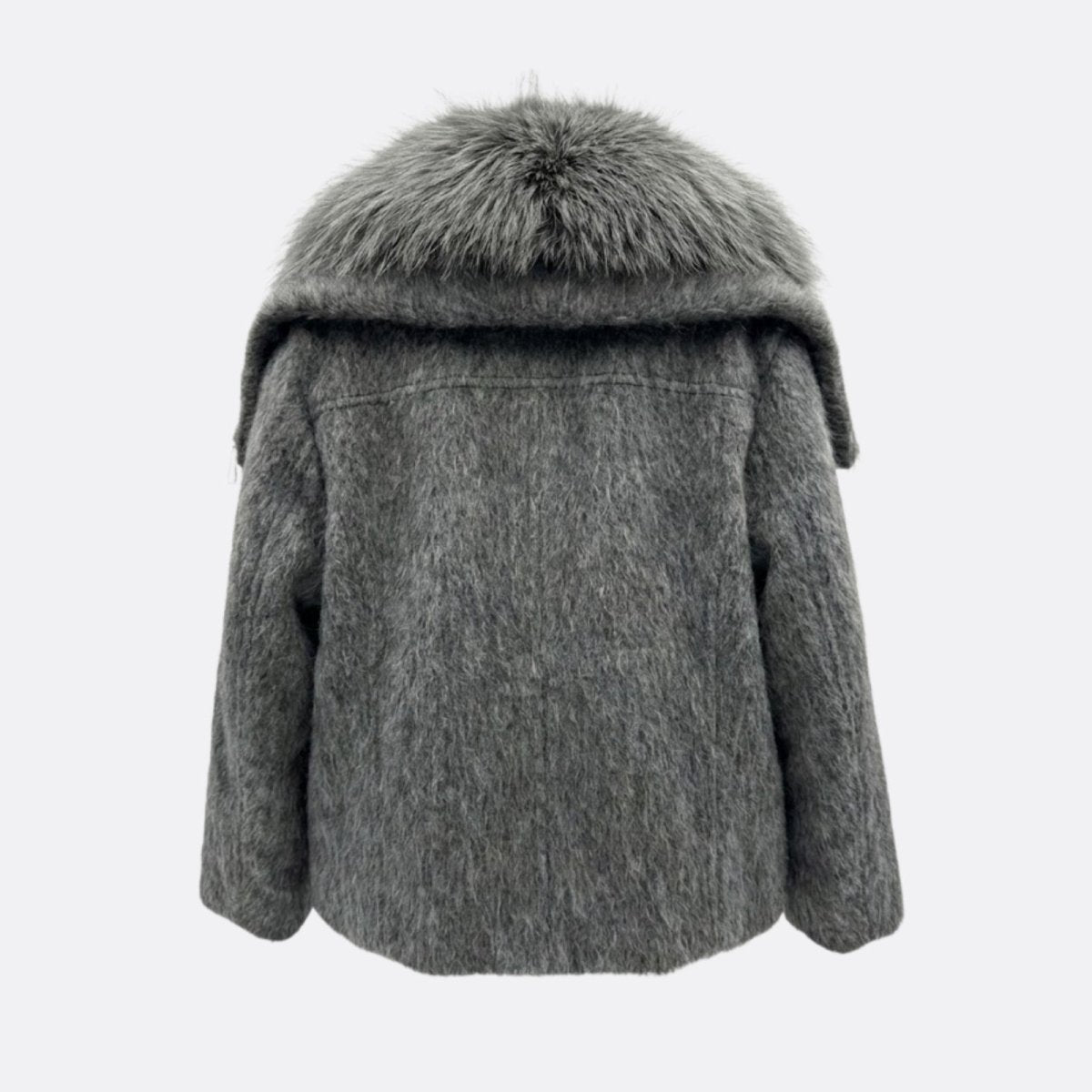 Flat lay product shot of the back of the Kouvr Dorothy dark grey wool jacket, showcasing the texture and collar construction.