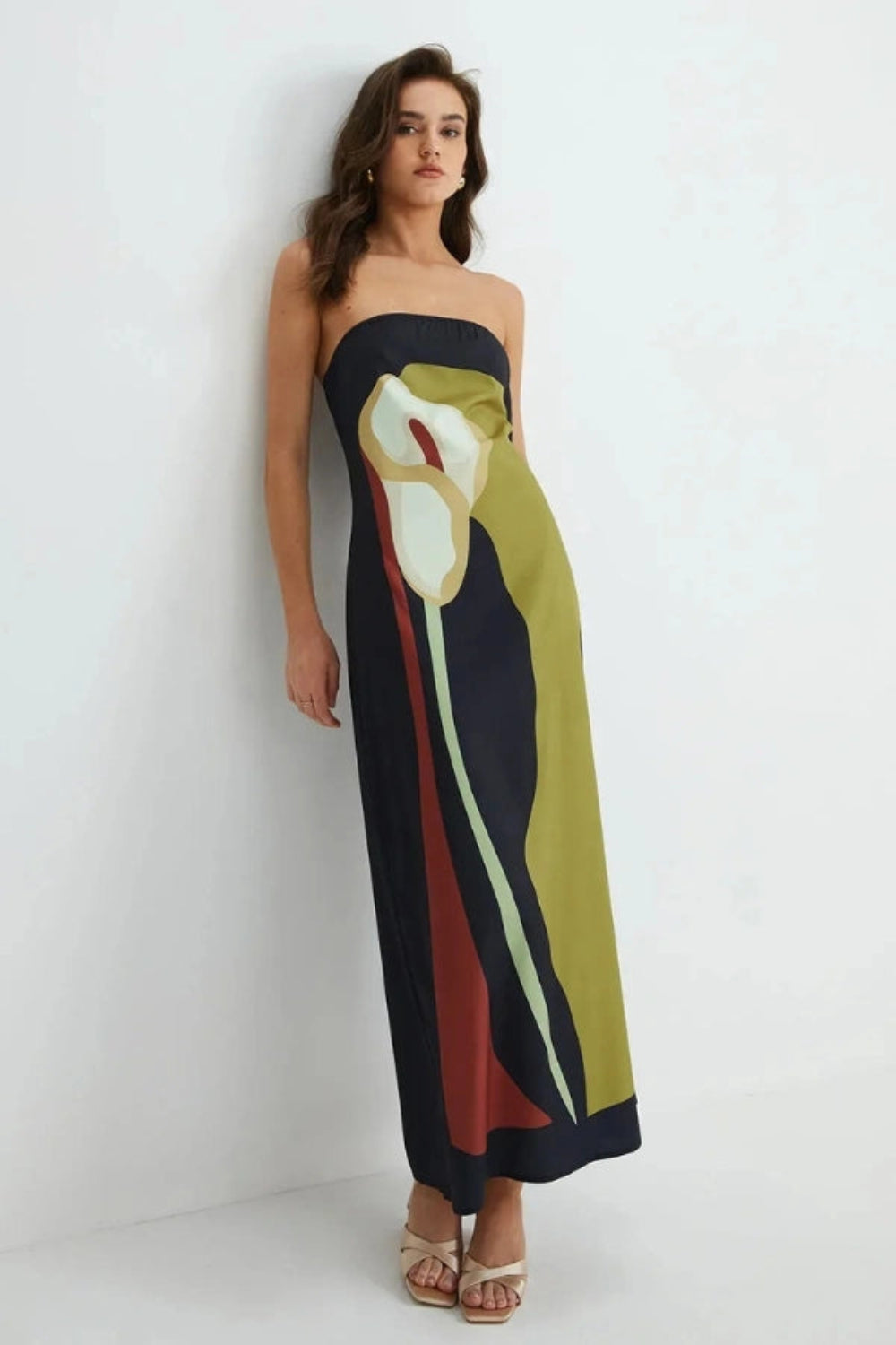 Model wearing the Kouvr Elizabeth abstract floral strapless evening dress