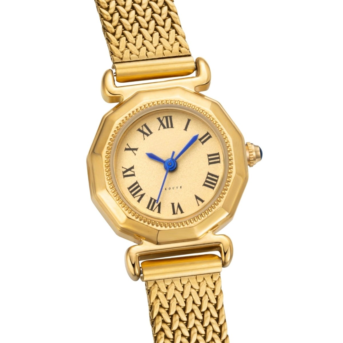 Gold Kouvr watch with a white face and blue hands on a white background