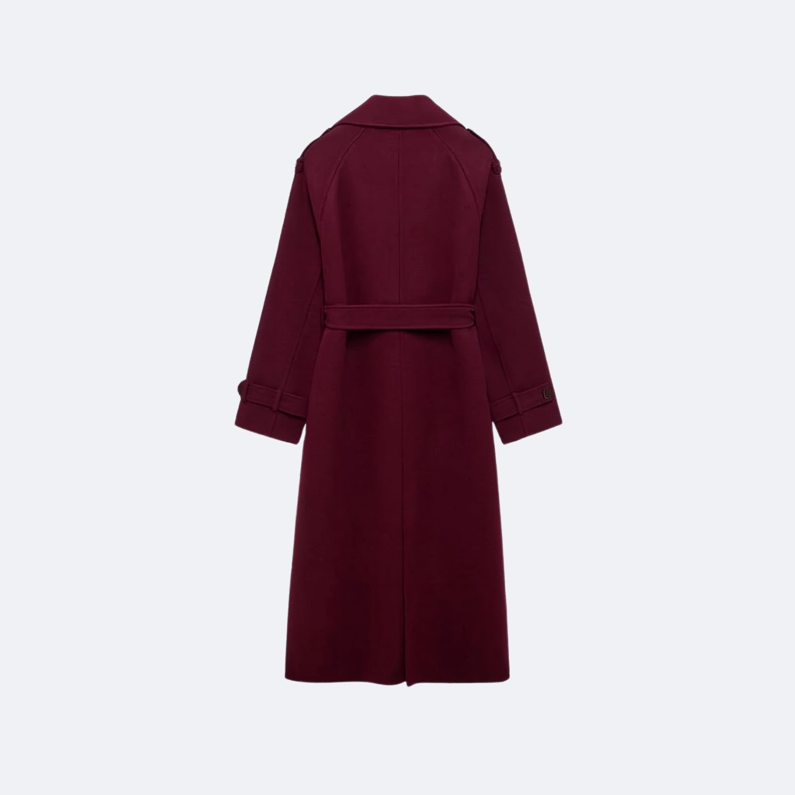 Flat lay of the back of the Kouvr Fashion Esther burgundy trench coat, detailing the back vent, belt loop, and shoulder construction.