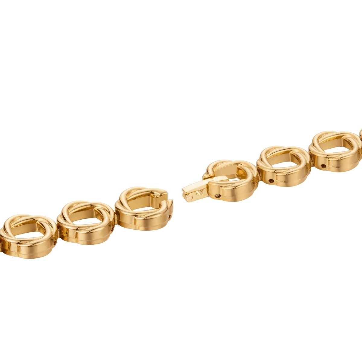 Gold kouvr bracelet on a white background