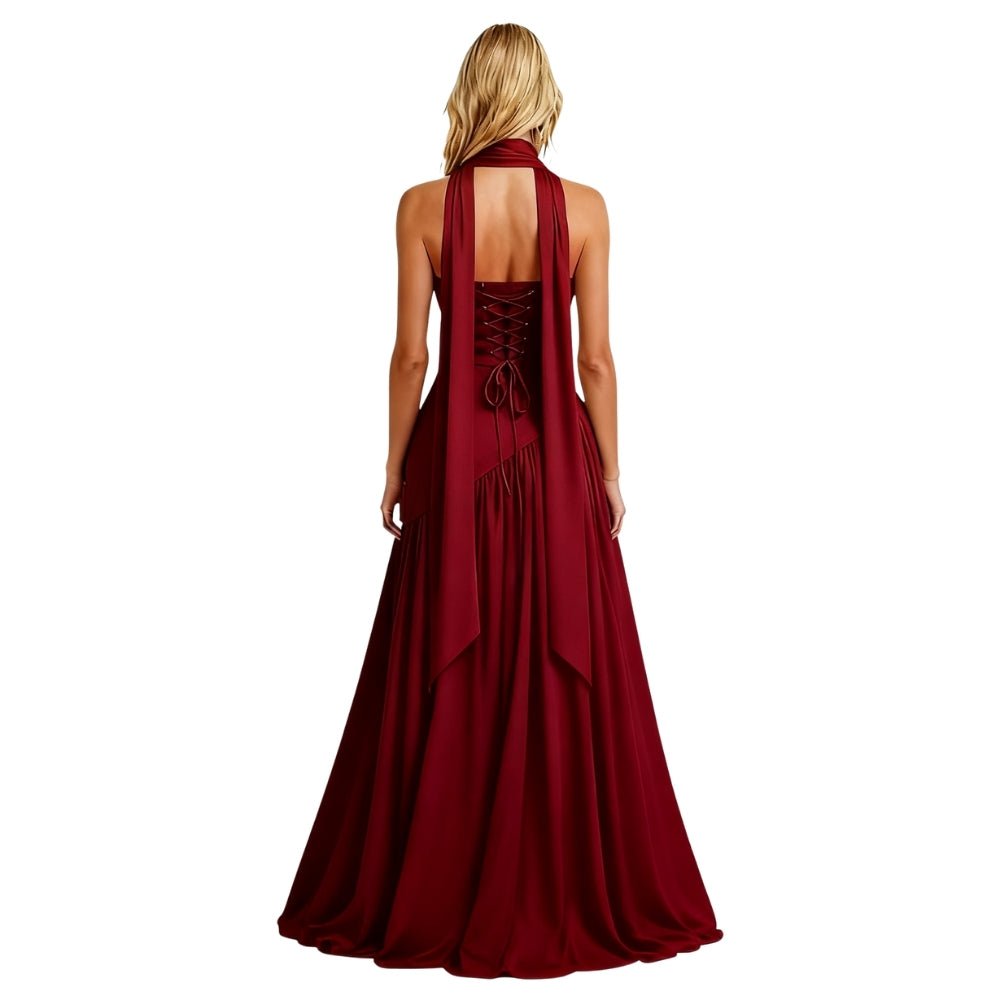 Burgundy Kouvr evening gown with open back on a white background