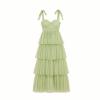 Green Kouvr tiered dress on a white background