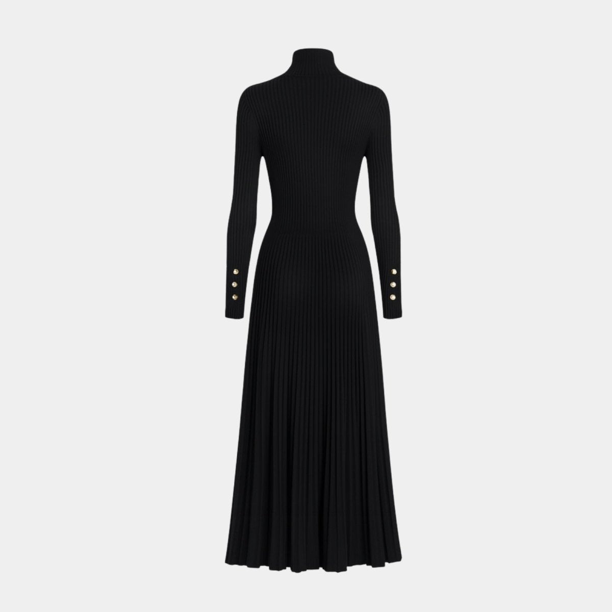 Flatlay of the Kouvr Fashion black turtleneck dress emphasizing the ribbed knit texture, pleated skirt, and gold cuff buttons.