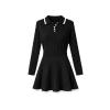 Flat lay of a long sleeve black polo sweater dress with pearl buttons, cable-knit texture, and white contrast tipping on the collar and hem.