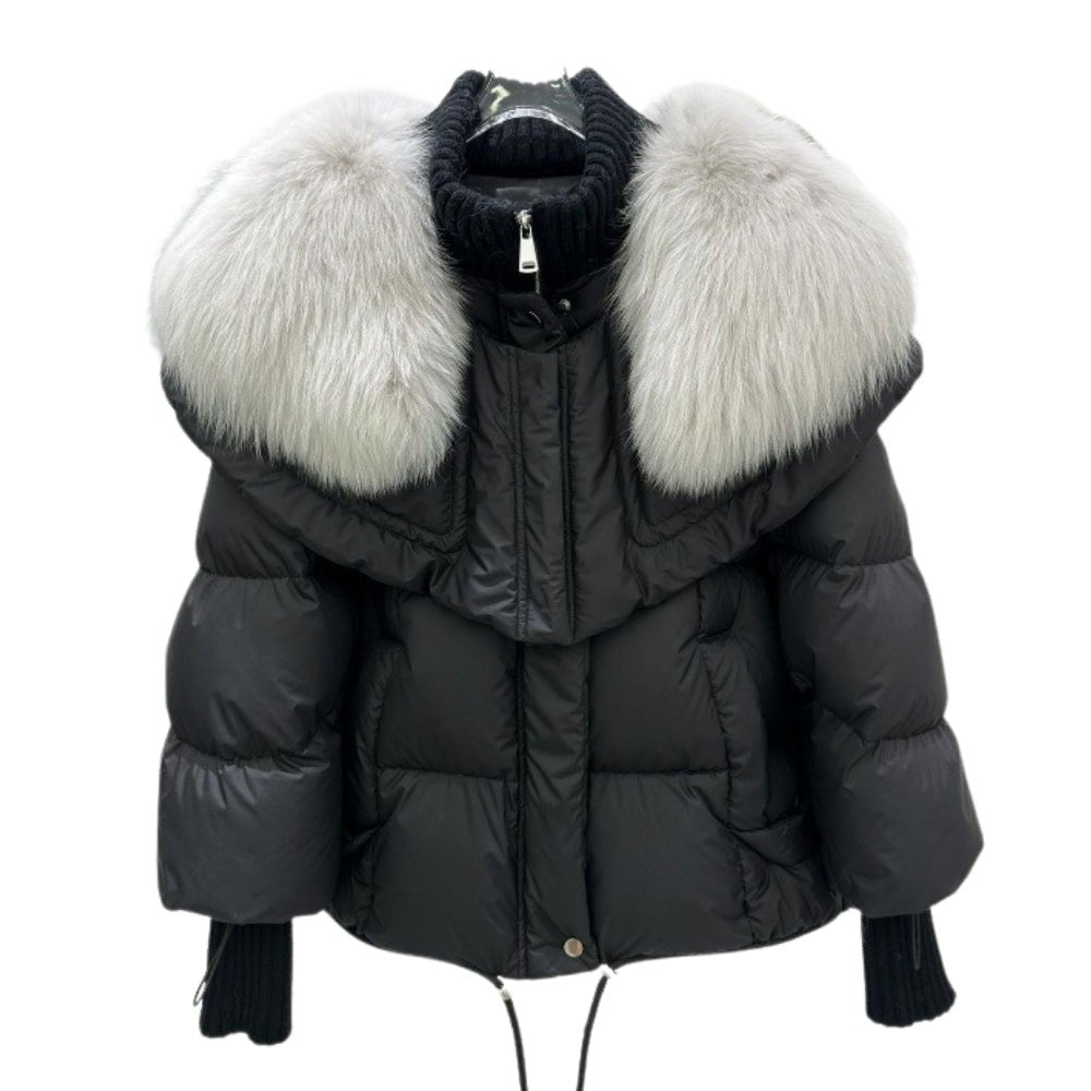 Black Kouvr puffer jacket with large fur collar on a white background