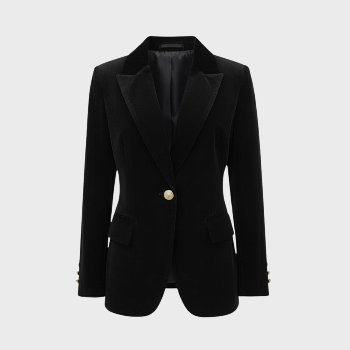 Product flat lay of the Kouvr Fashion black single-breasted velvet blazer, showing the satin lapels and gold statement button.