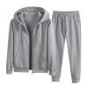 Flat lay of the Kouvr Fashion men's tracksuit in heather grey, showing the waffle-knit zip hoodie and matching jogger pants side-by-side.