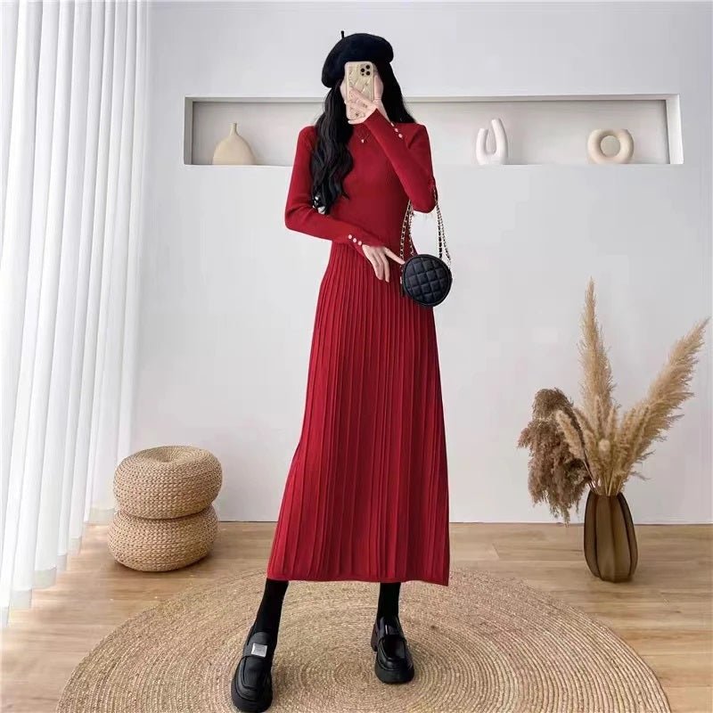 Woman wearing the statement red Dannah long sleeve pleated knit midi dress from Kouvr Fashion, styled with a black beret and loafers.