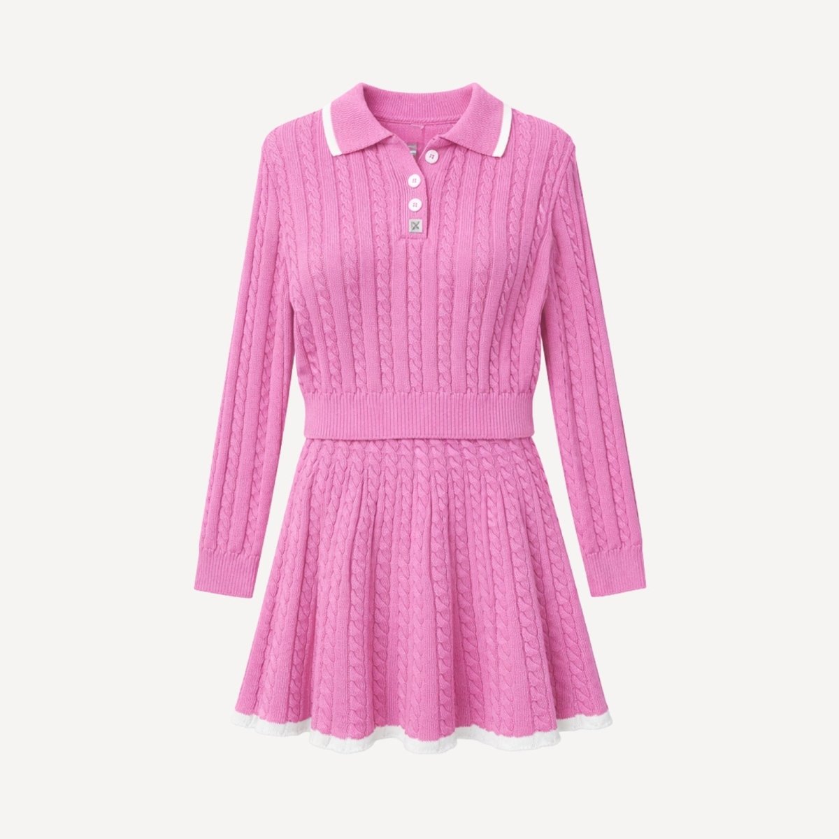 Flatlay studio shot of the dark pink cable-knit polo sweater and pleated skirt set, displaying the full outfit and details like the collar and buttons.