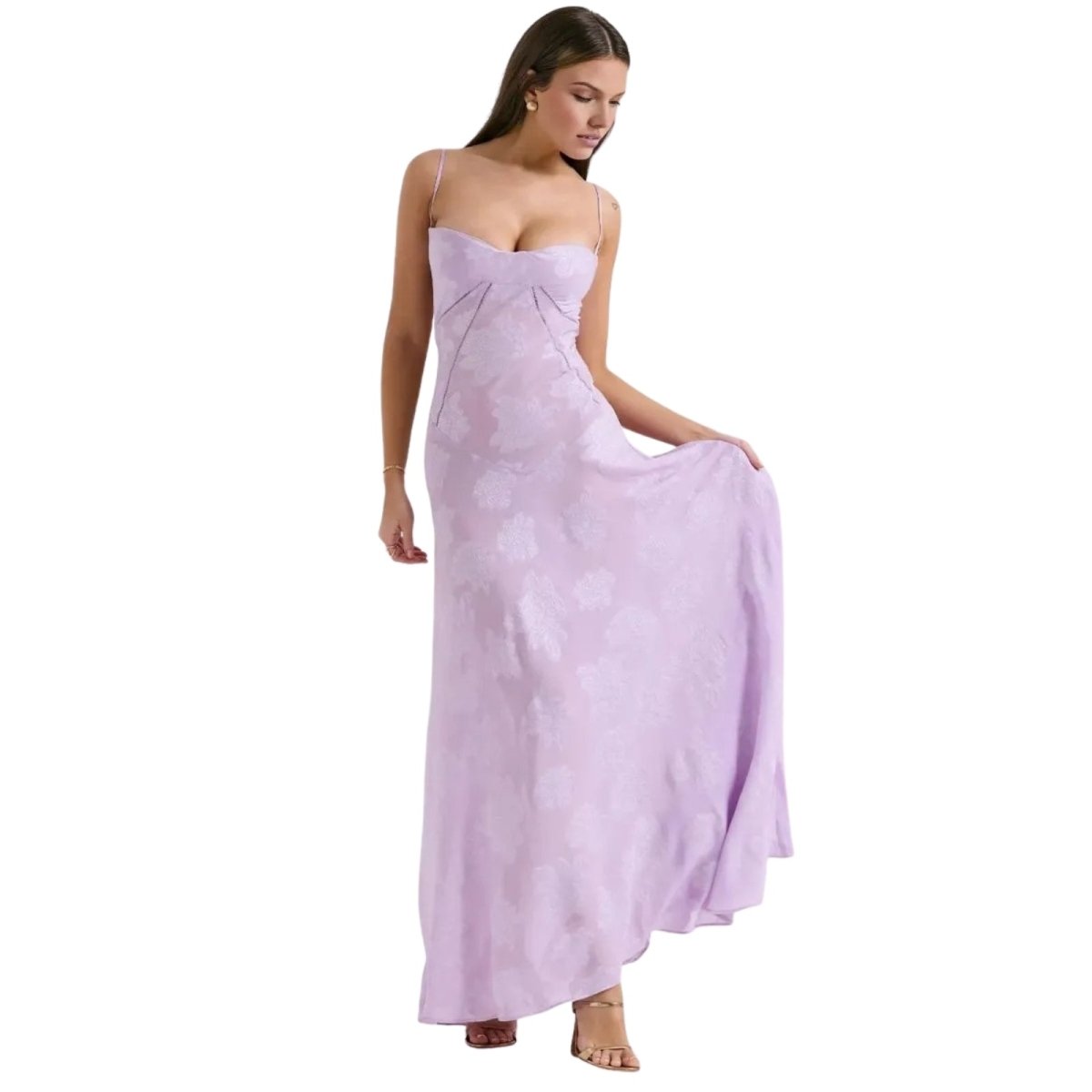 Woman wearing a light purple Kouvr dress on a white background