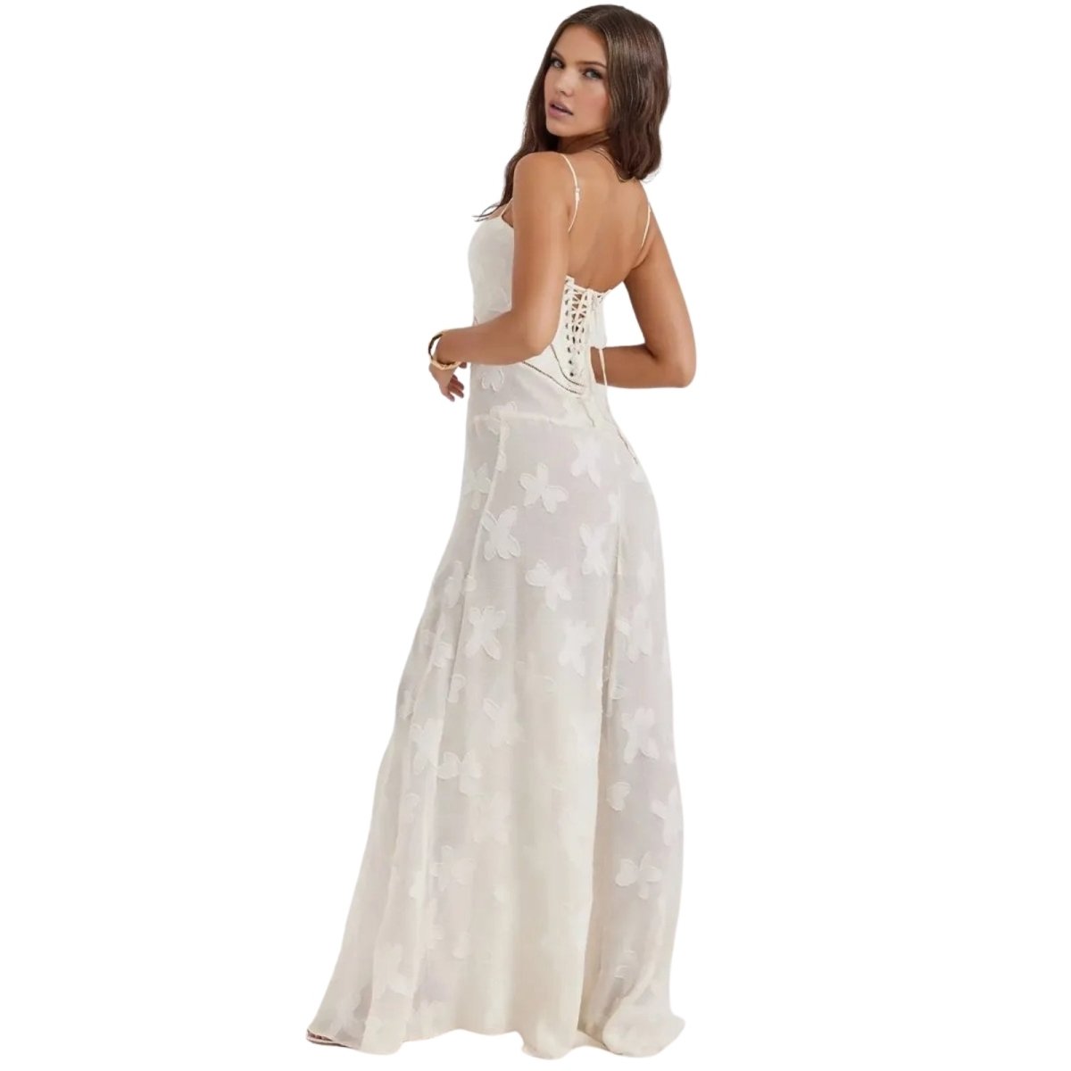 Woman wearing a white Kouvr floral dress on a white background