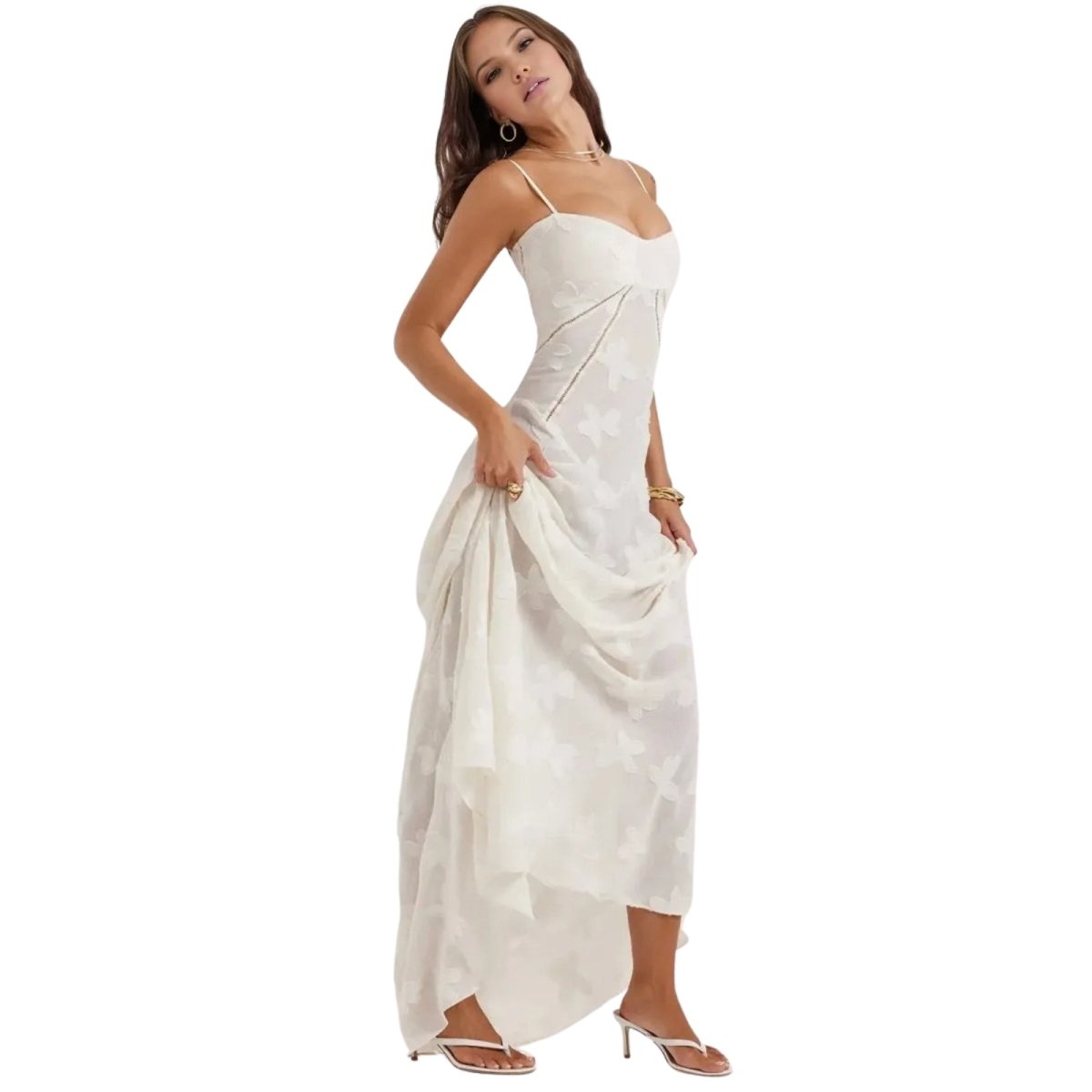 Woman wearing a white Kouvr dress on a white background