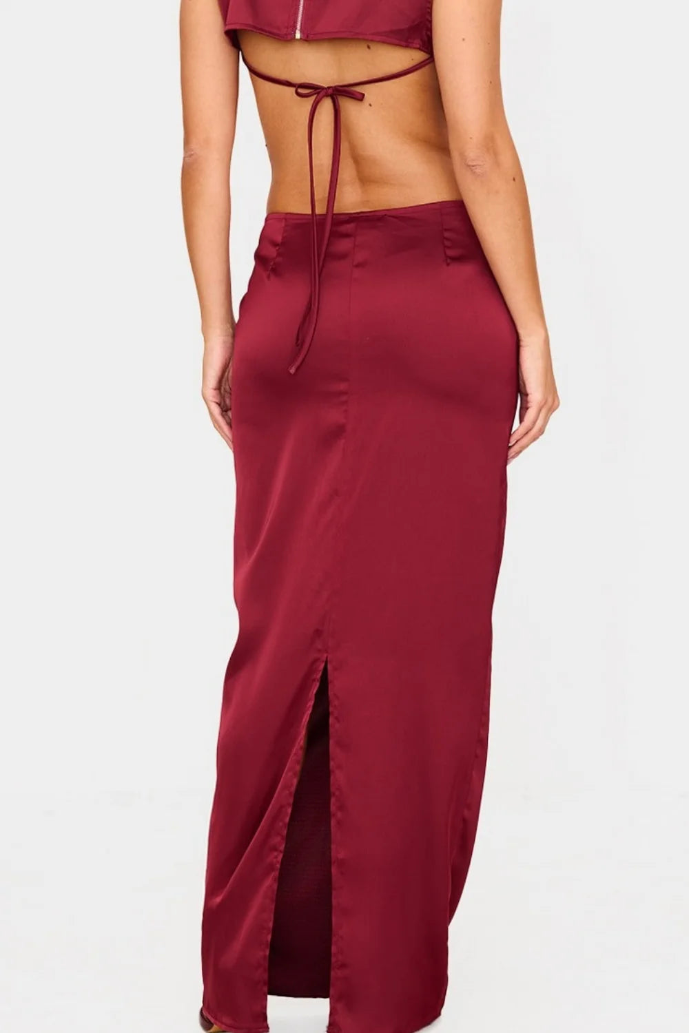 matching set," "eveningwear," "special occasion outfit," "minimalist formal," "bias-cut skirt," "sleeveless high-neck top," "wedding guest attire